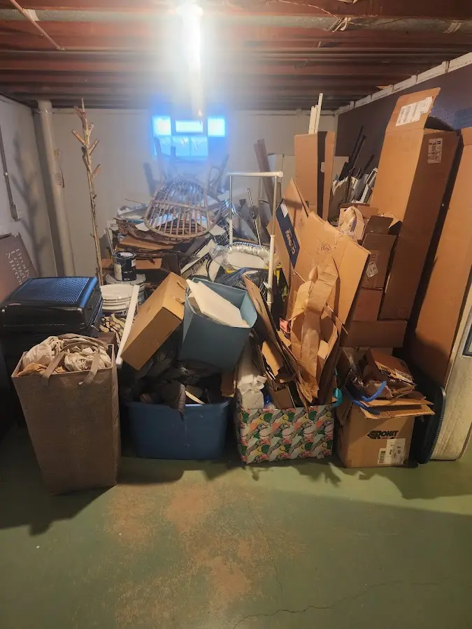 Roll-off dumpster container at job site for 15 Yard Dumpster Rental in Webster